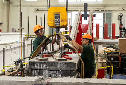 Students working on a Bridge Collision Study. Links to Closely Held Business Stock